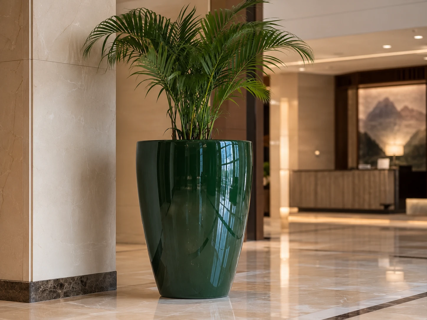 LEAFO planter in glossy finish with plant in a refined lobby setting
